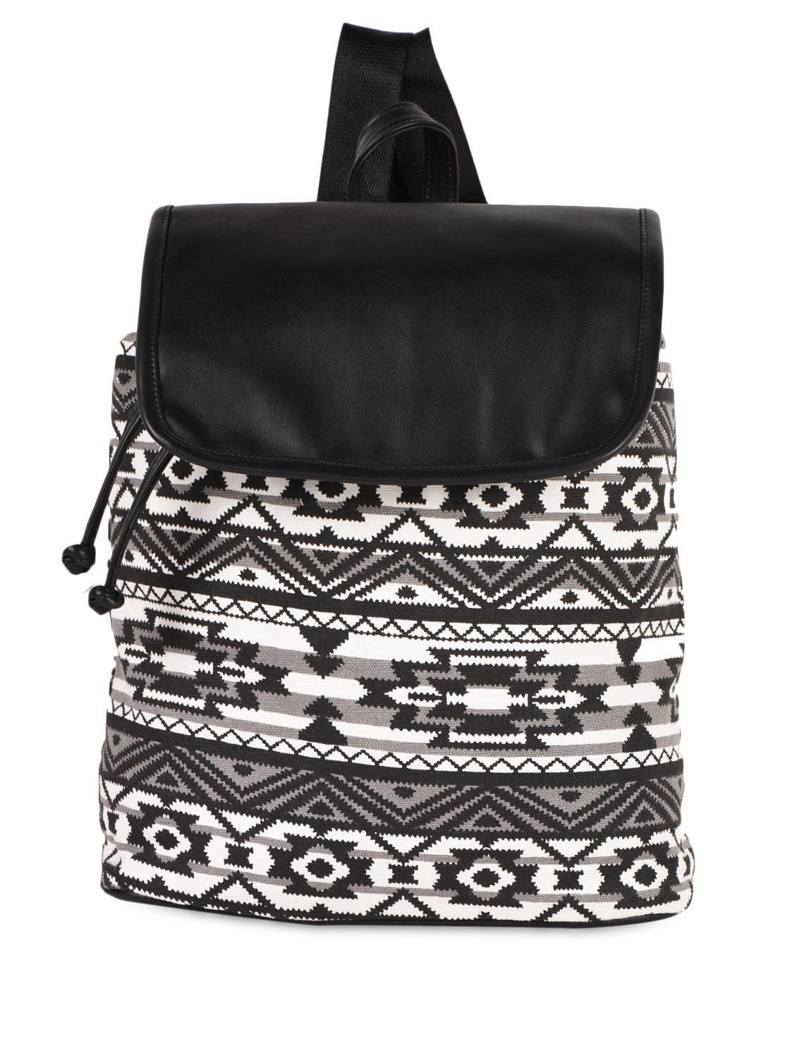 white canvas backpack