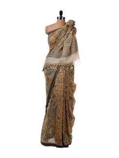 Off-white saree with all over print - Saboo