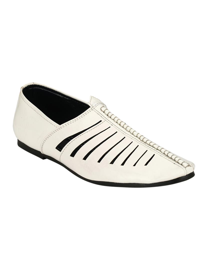 white synthetic slip on jutis