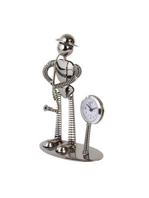 jewel fuel iron musician playing saxophone table clock - 13749197 - Standard Image - 3