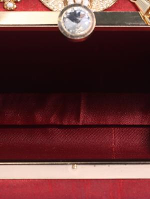 red metal structured clutch - 13949075 - Standard Image - 3