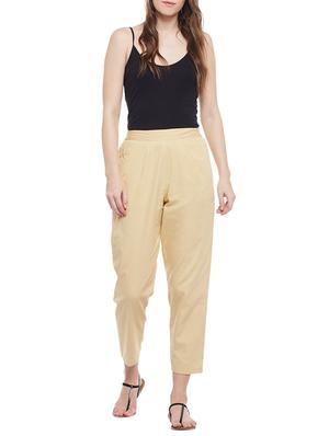 beige solid cotton peg trouser - 15054071 - Standard Image - 4