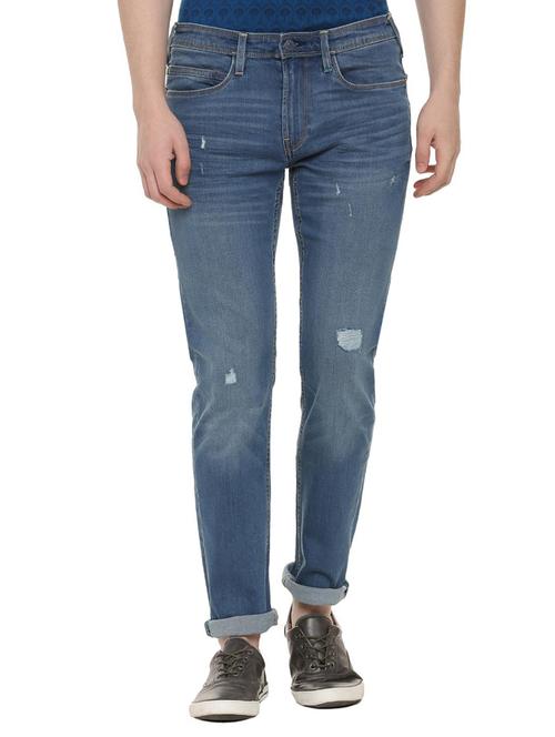 blue ripped jeans - 16078492 - Standard Image - 1