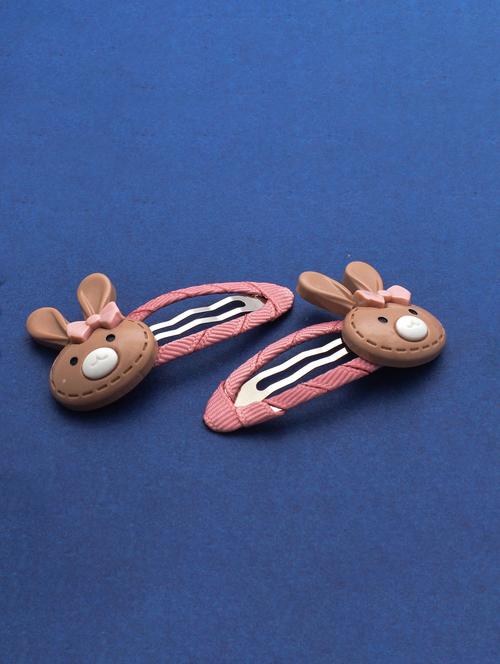 brown colored plastic hair accessory - 16542729 - Standard Image - 1