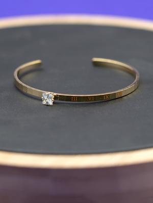 gold metal bangle bracelet - 16636114 - Standard Image - 2