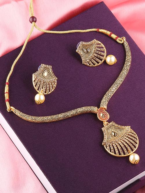 gold metal necklaces and earring - 16712494 - Standard Image - 1