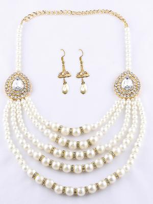 white metal necklaces and earring - 16712497 - Standard Image - 2