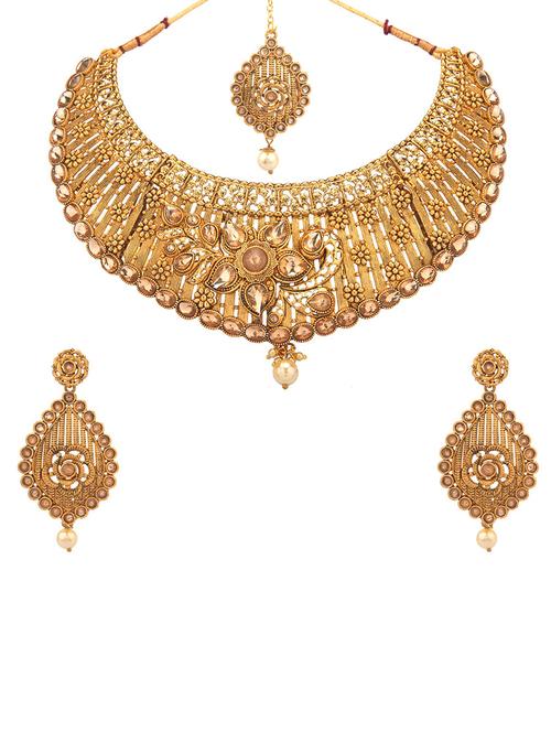 gold metal necklaces and earring - 16738042 - Standard Image - 1