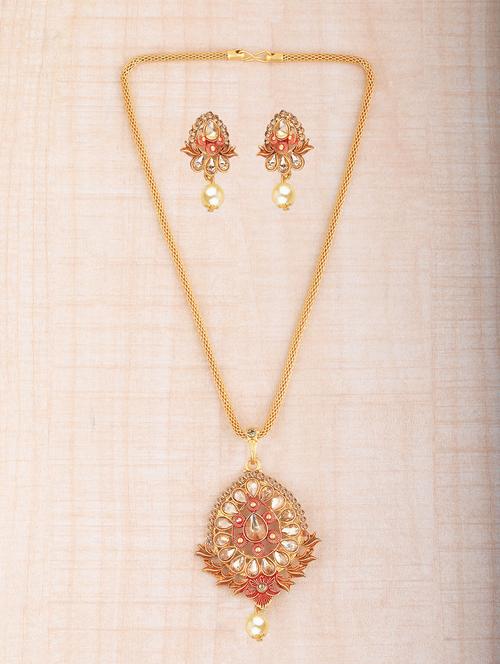 red metal necklaces and earring - 16791217 - Standard Image - 1