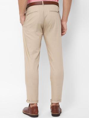 beige solid chinos - 16963638 - Standard Image - 2