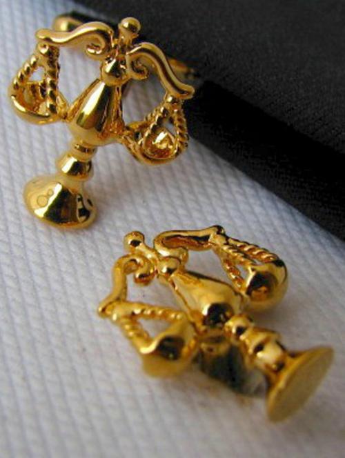 gold metal cufflinks - 17068917 - Standard Image - 1