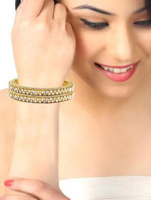 gold brass bangle - 17069336 - Standard Image - 2
