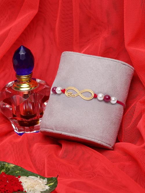 gold-plated bro rakhi with roli chawal - 17148661 - Standard Image - 1
