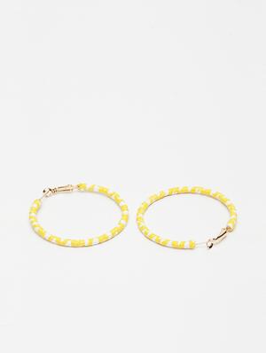 yellow metal hoop earring - 17289362 - Standard Image - 3
