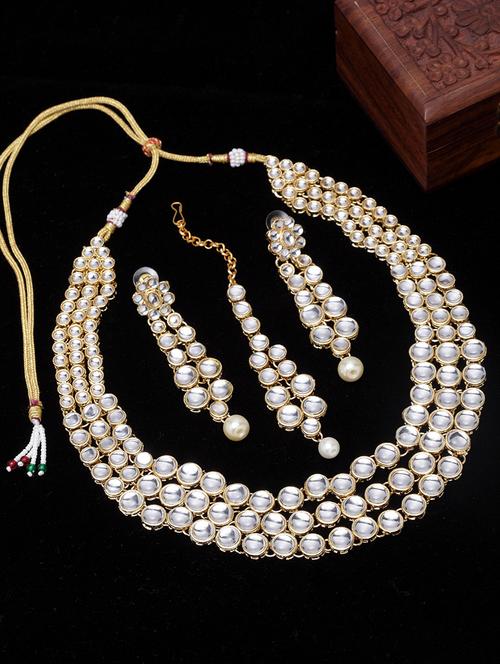 gold metal necklaces and earring - 17534211 - Standard Image - 1
