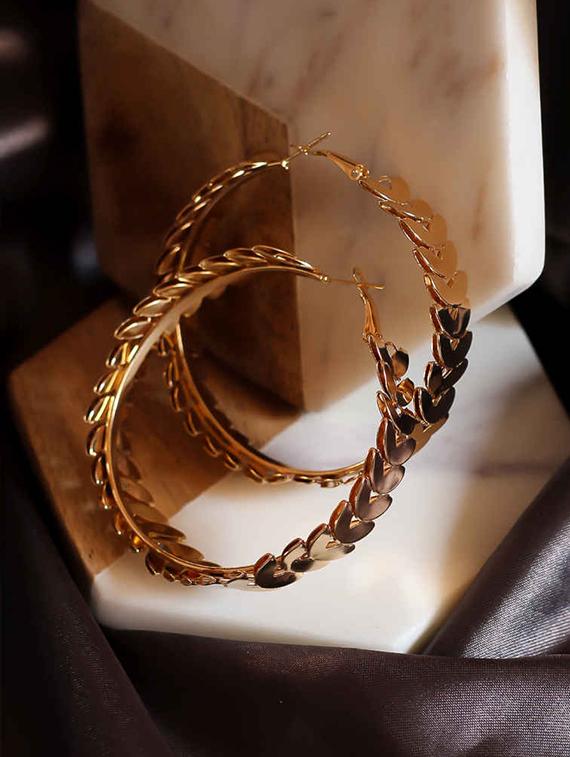 gold metal hoop earrings - 17565289 - Zoom Image - 2