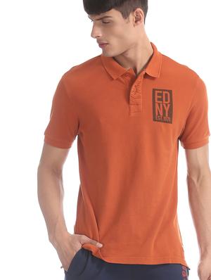 orange typographic polo t-shirt - 17630949 - Standard Image - 2