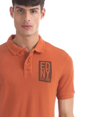 orange typographic polo t-shirt - 17630949 - Standard Image - 5