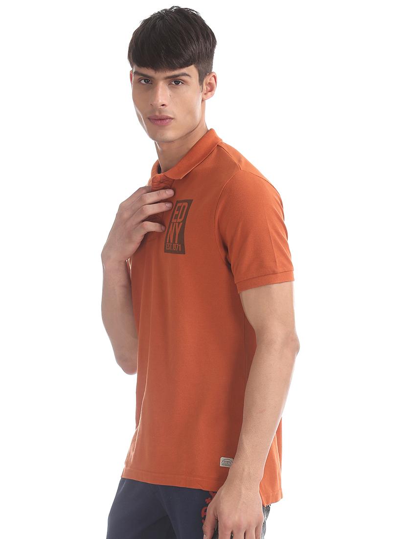 orange typographic polo t-shirt - 17630949 - Zoom Image - 1