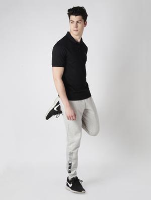 black solid polo t-shirt - 17633157 - Standard Image - 4