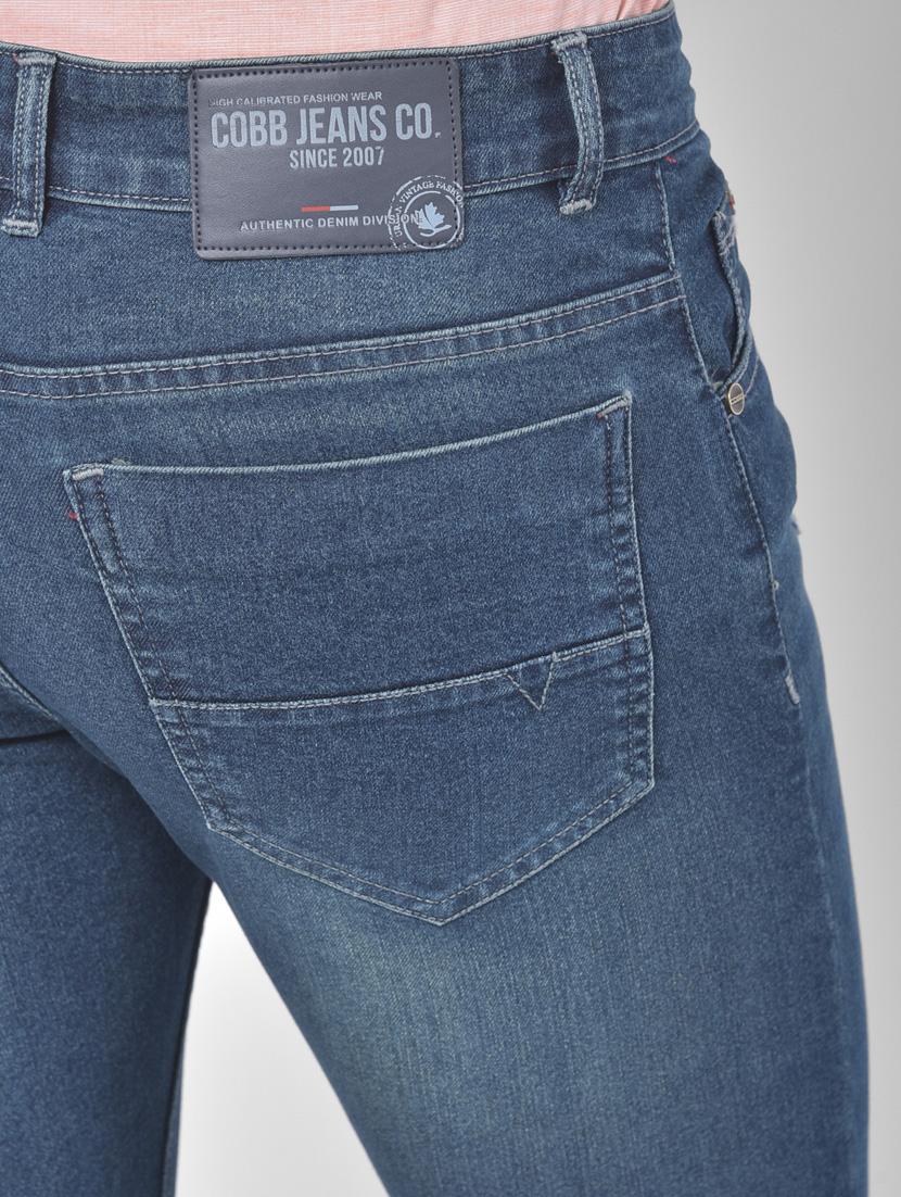 blue light washed ripped denim jeans - 17650223 - Zoom Image - 5