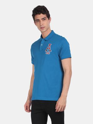 blue solid polo t-shirt - 17807982 - Standard Image - 2