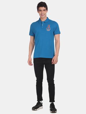 blue solid polo t-shirt - 17807982 - Standard Image - 4