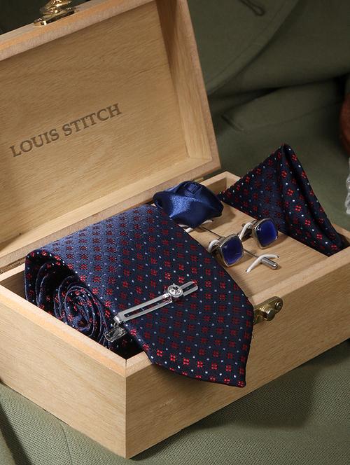 blue dotted pattern feel silk that is soft, rich in colour and beautiful to feel. the stitching thread are well finished. premium heavy quali interlining gets a perfect knot everytime. loved worldwide for sle ty - 18196168 - Standard Image - 1