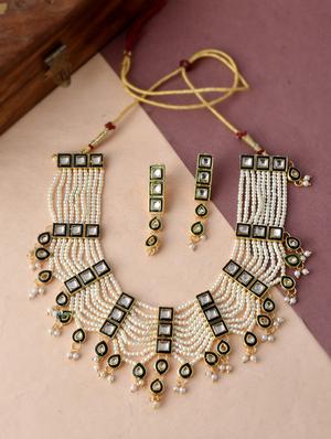 white brass necklaces and earring - 18387596 - Standard Image - 2