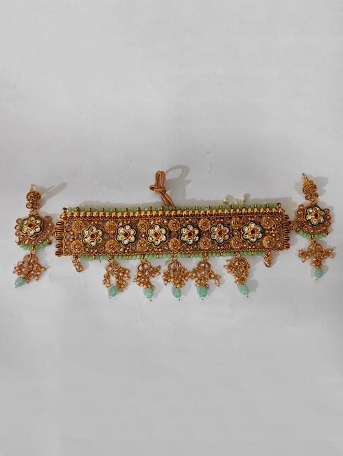 green brass necklaces and earring - 18394697 - Standard Image - 1