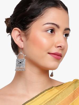 silver metal earring - 18409408 - Standard Image - 4