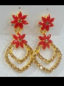 women stylist earring - 18439980 - Standard Image - 1