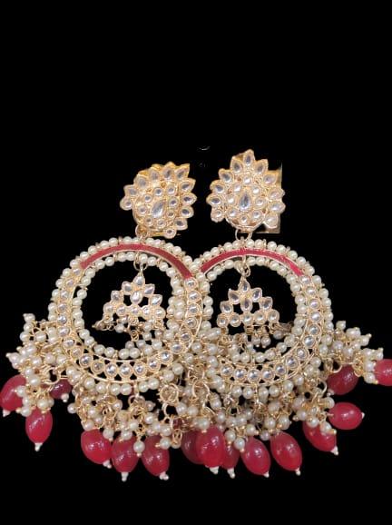 women stylish earring - 18447350 - Standard Image - 1
