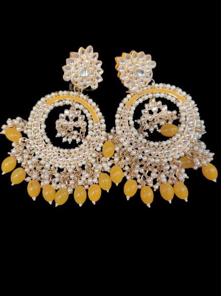 women stylish earring - 18447351 - Standard Image - 1