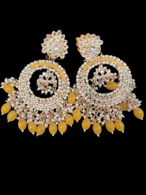 women stylish earring - 18447351 - Standard Image - 2