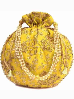 women embroidered potlis - 18447459 - Standard Image - 2