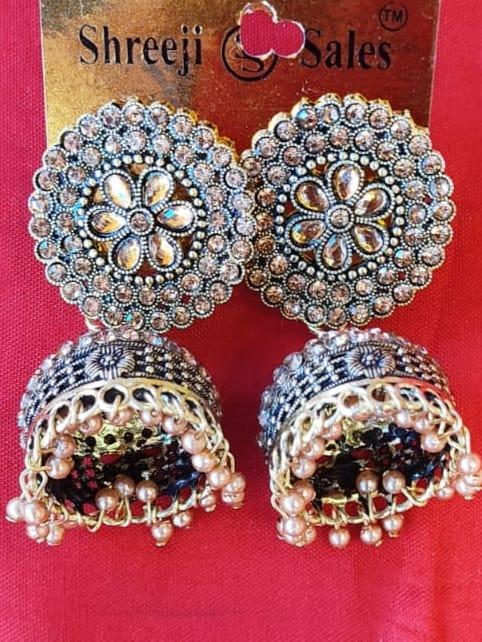 women stylish earring - 18468766 - Very Small Image - 1