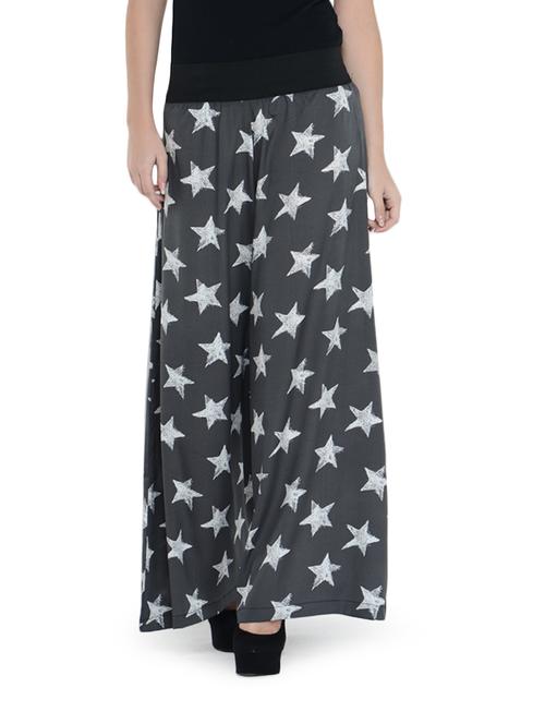 Black polyester crepe palazzo pants with star prints - 866120 - Very Small Image - 1