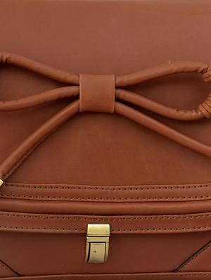 brown bow embellished leatherette sling bag - 9614993 - Standard Image - 4
