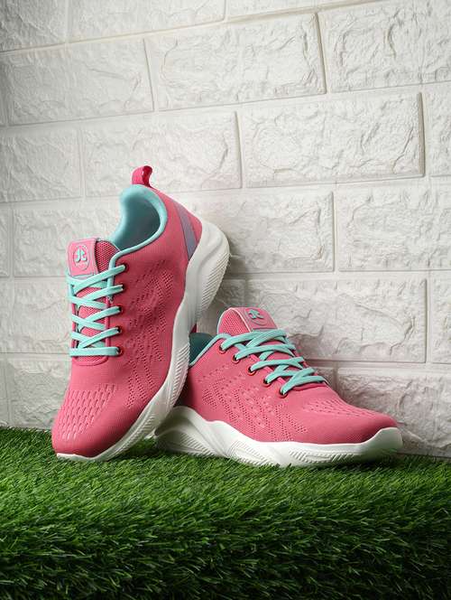 pink flyknit laceup sports shoes