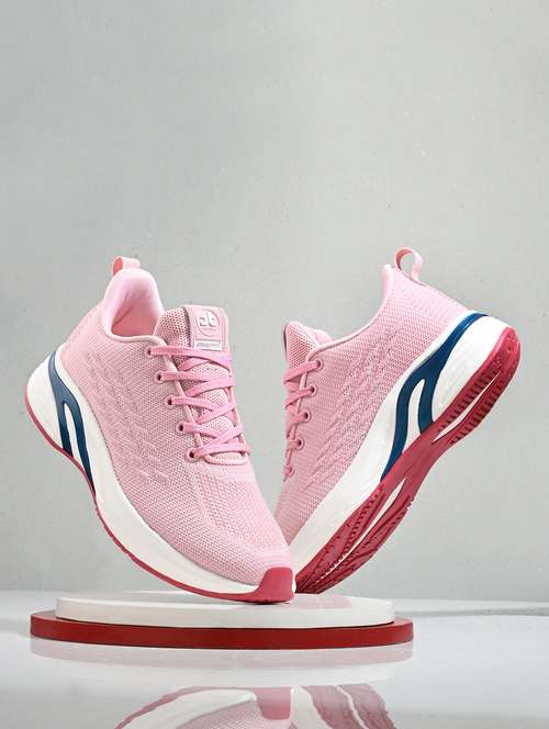 pink flyknit laceup sports shoes