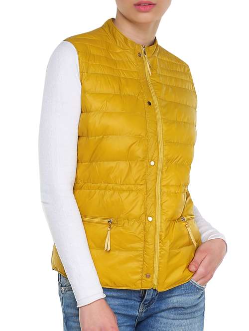 yellow sleeveless jacket